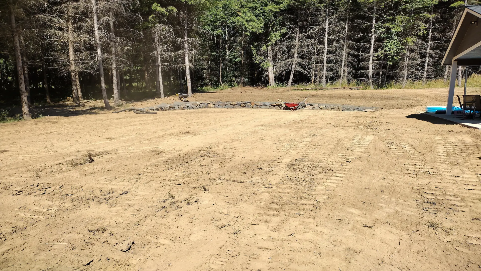 A newly transformed backyard ready for family entertainment, a testament to ACP Hauling & Excavation's expertise in bringing visions to life.