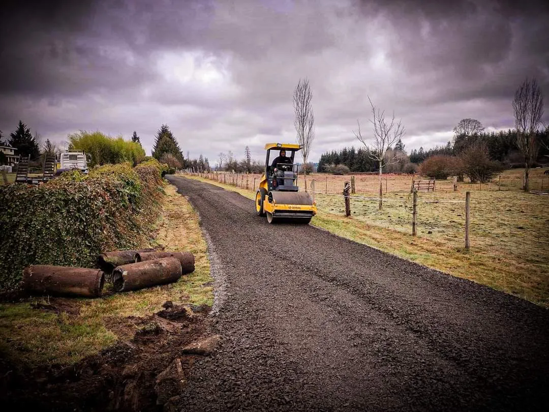 beautiful driveway being rolled with machinery